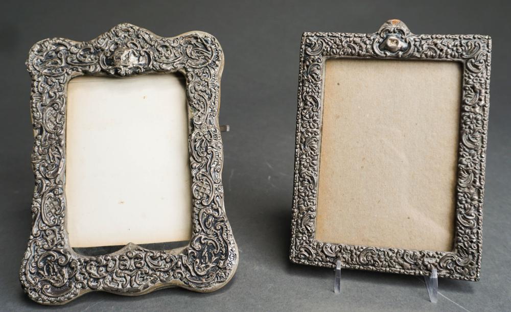 TWO REPOUSSE SILVER MOUNTED PHOTO