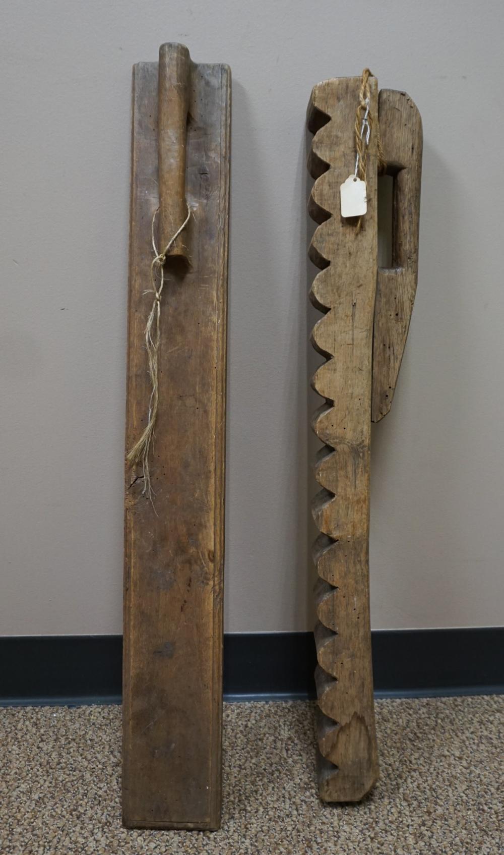 TWO CARVED WOOD TOOLSTwo Carved