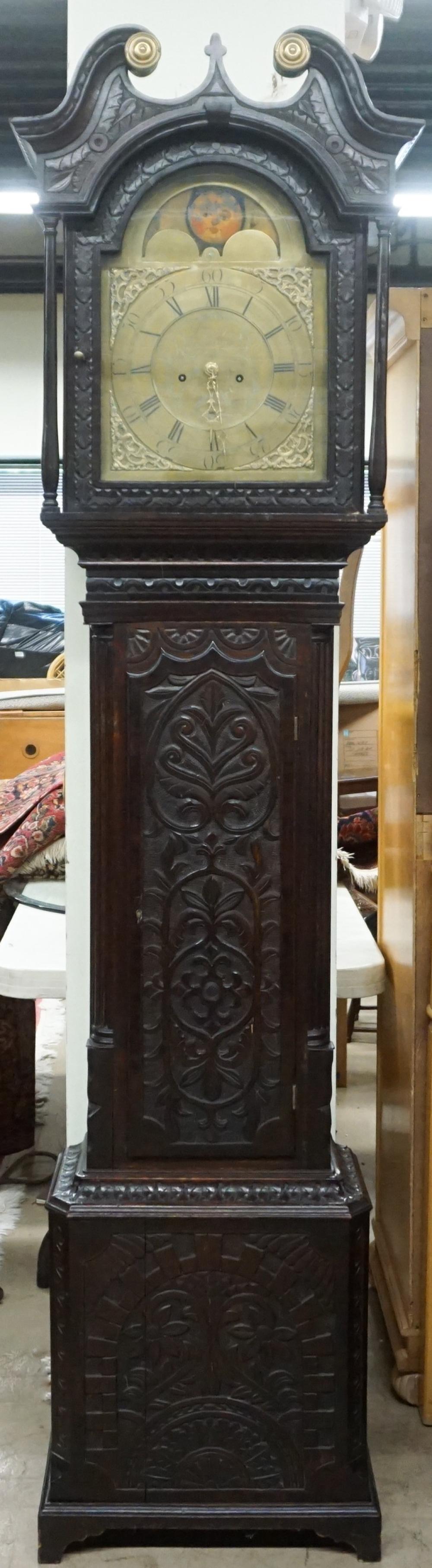 GEORGE III CARVED OAK TALL CASE