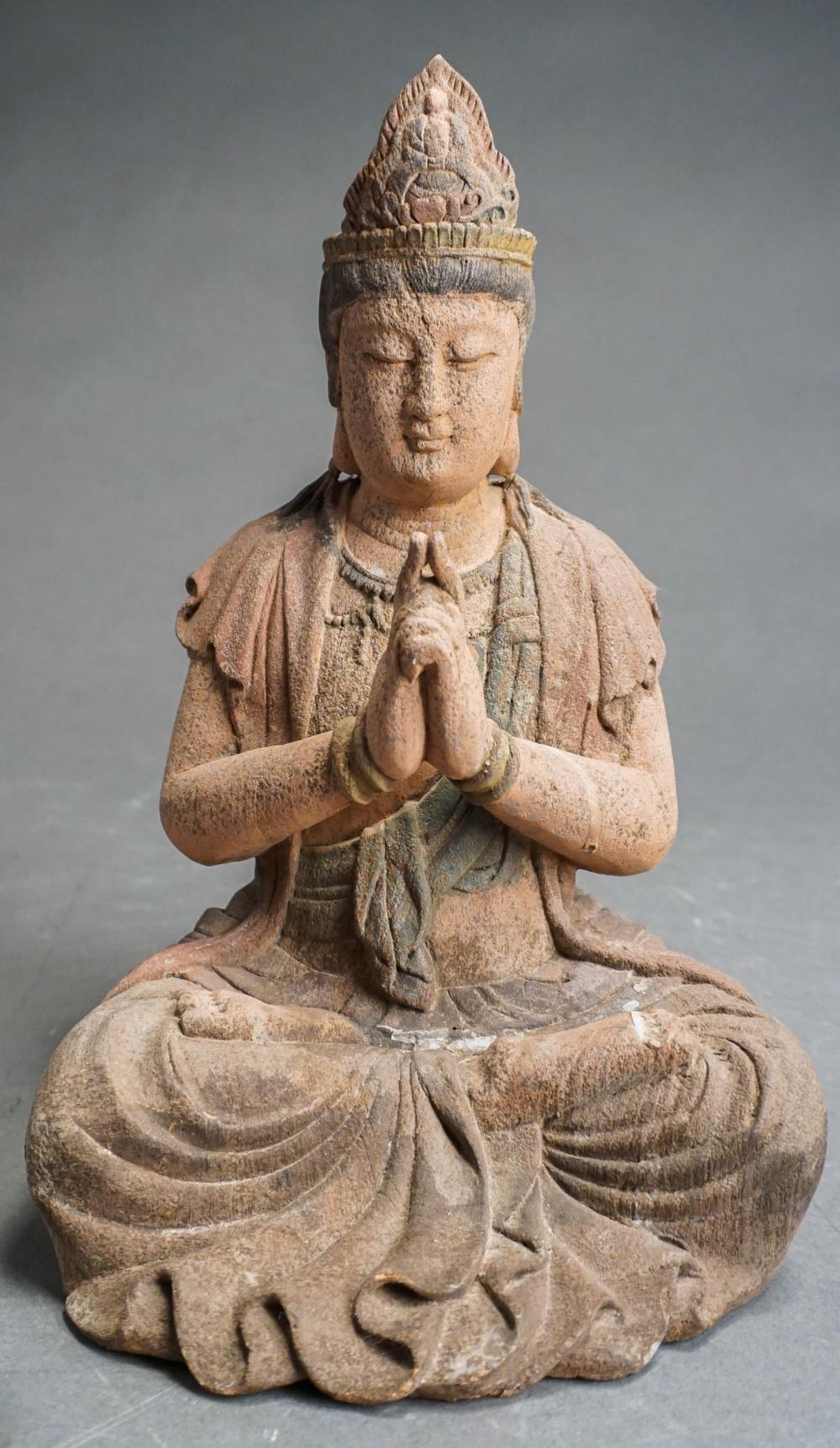 CARVED WOOD FIGURE OF A SEATED