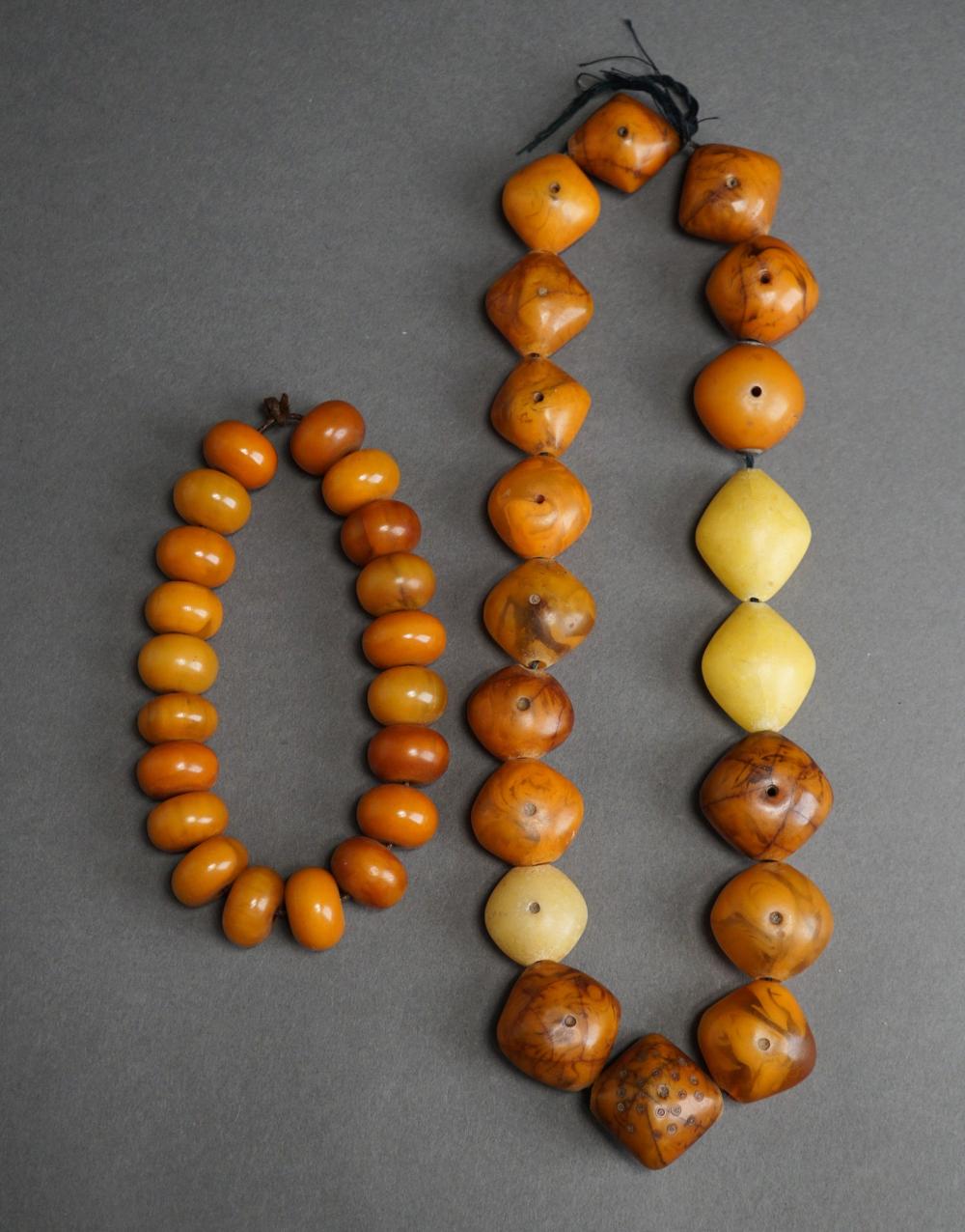 TWO AMBER BEAD NECKLACESTwo Amber 32c8c6