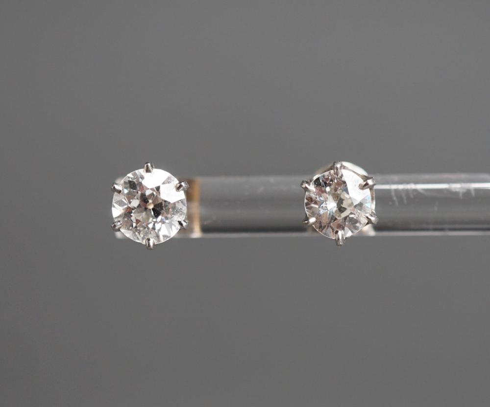 TWO DIAMOND STUD PIERCED EARRINGSTwo 32cac9