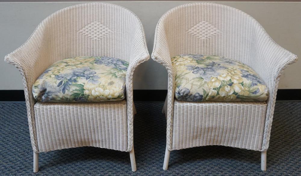 FOUR WHITE PAINTED WICKER ARM CHAIRS,