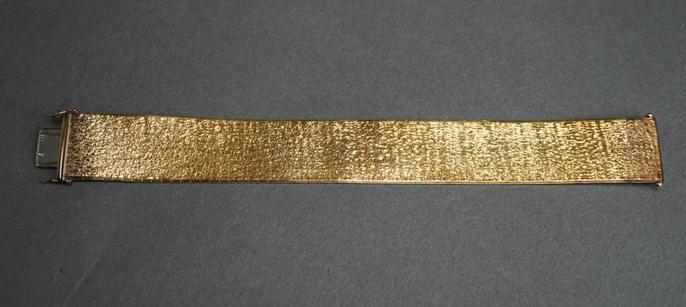 14 KARAT YELLOW GOLD WIDE FLEXIBLE 32ccb1