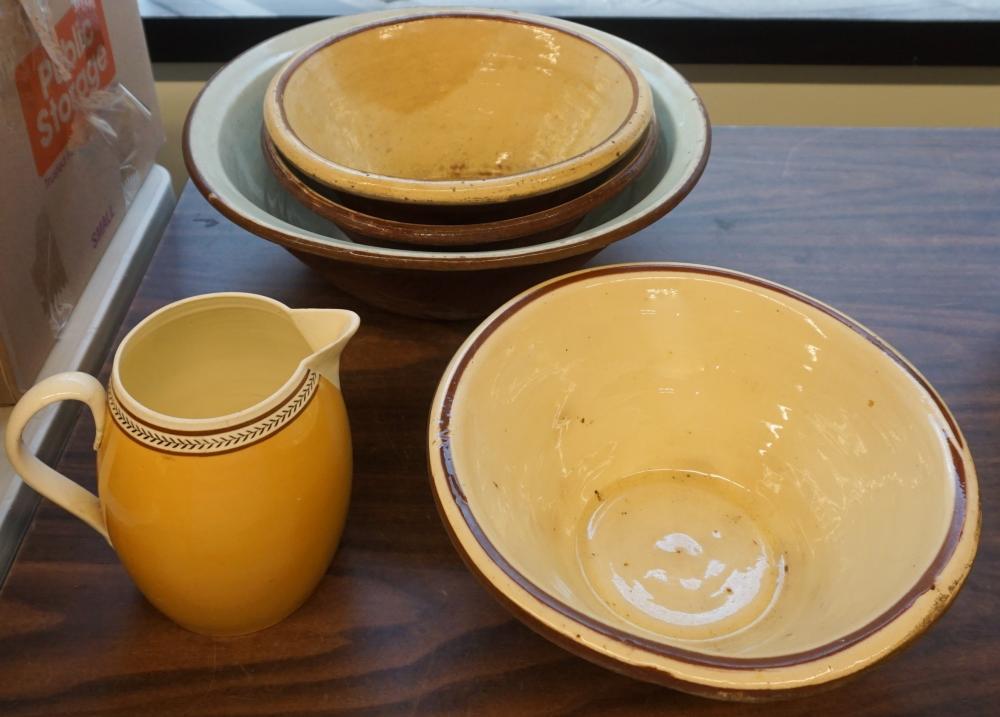 SET OF FOUR REDWARE BOWLS AND A