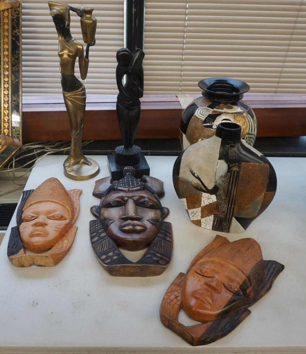 THREE CARVED WOOD MASKS, TWO CERAMIC