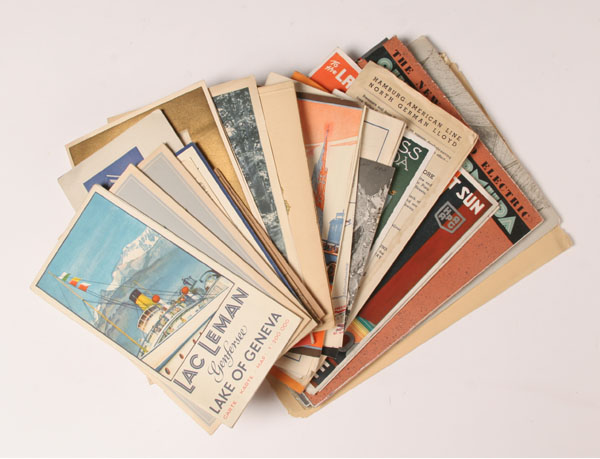 Lot of early travel programs, brochures,