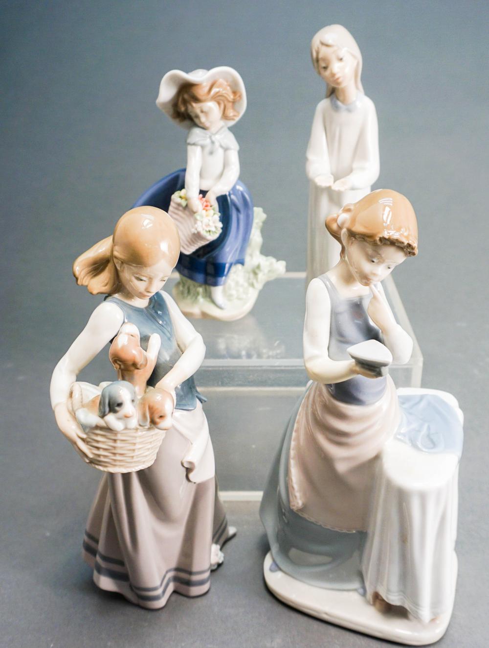 FOUR ASSORTED LLADRO PORCELAIN FIGURINES