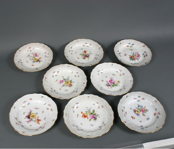 Eight Meissen hand painted porcelain