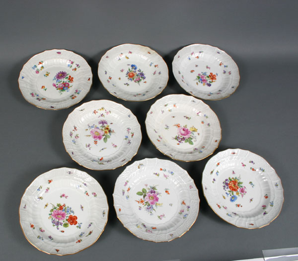 Eight Meissen porcelain deep plates