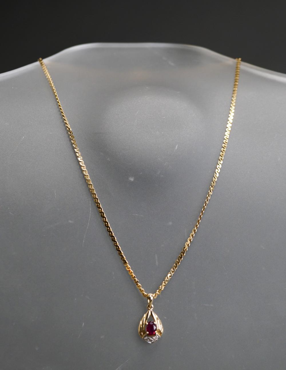 14 KARAT YELLOW GOLD RUBY AND 32b021