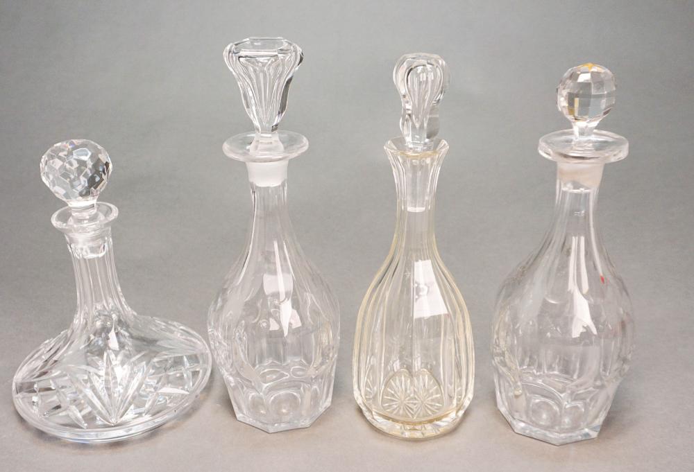 FOUR ASSORTED CRYSTAL DECANTERSFour 32b0c9