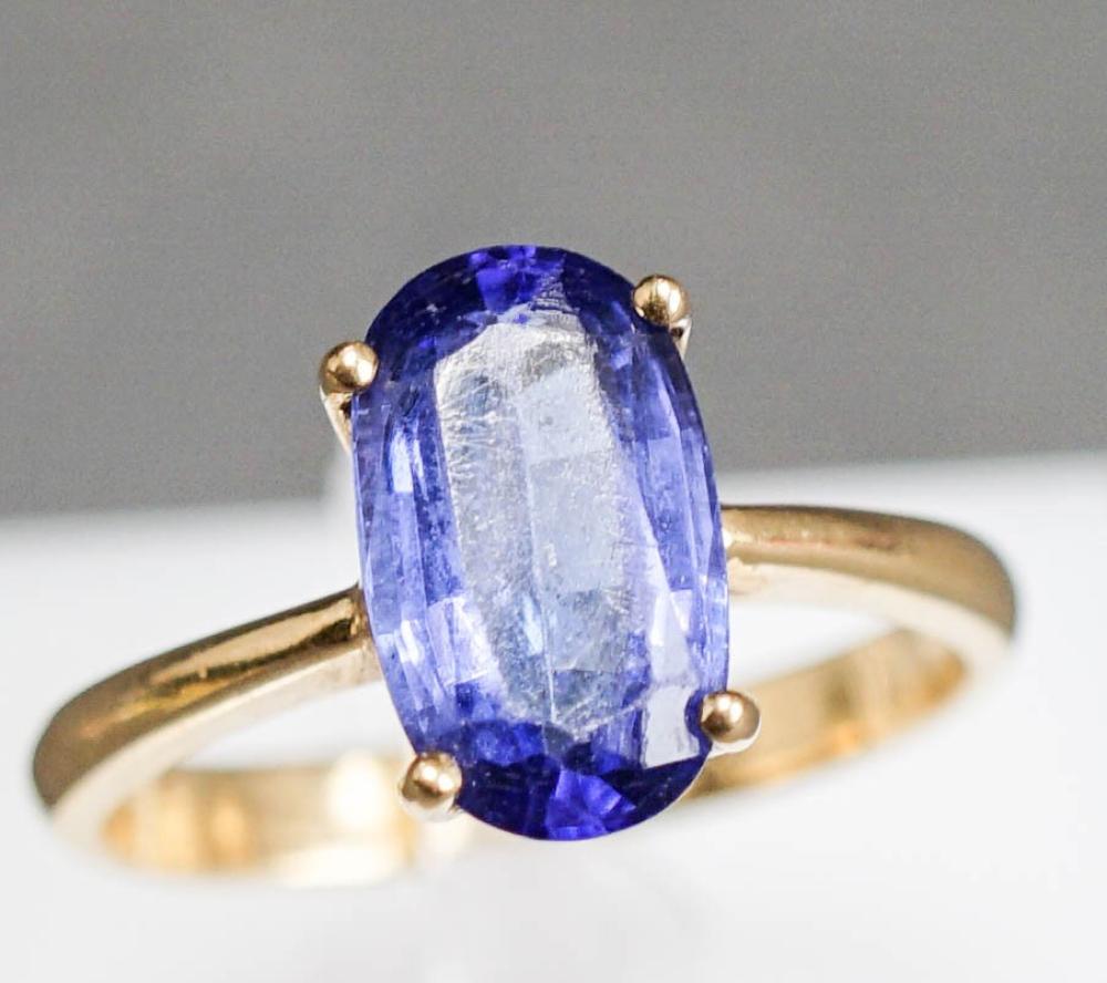 18 KARAT YELLOW GOLD AND TANZANITE 32b266