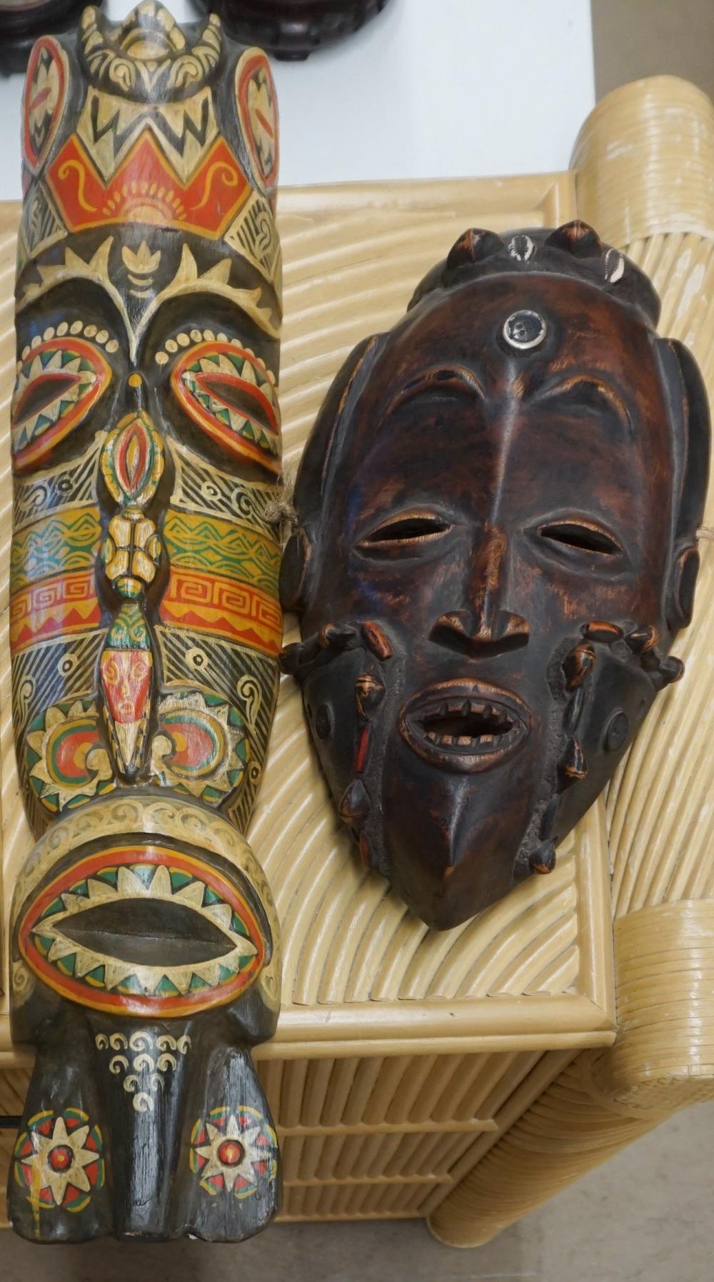TWO AFRICAN WOOD MASKSTwo African