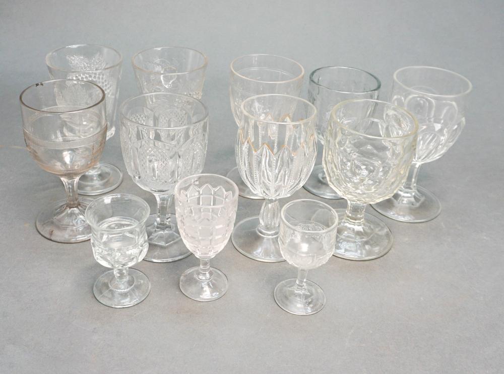 TWELVE ASSORTED MOLDED GLASS GOBLETS