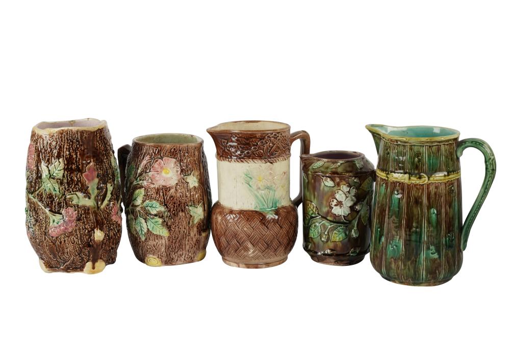 FIVE MAJOLICA POTTERY PITCHERSeach