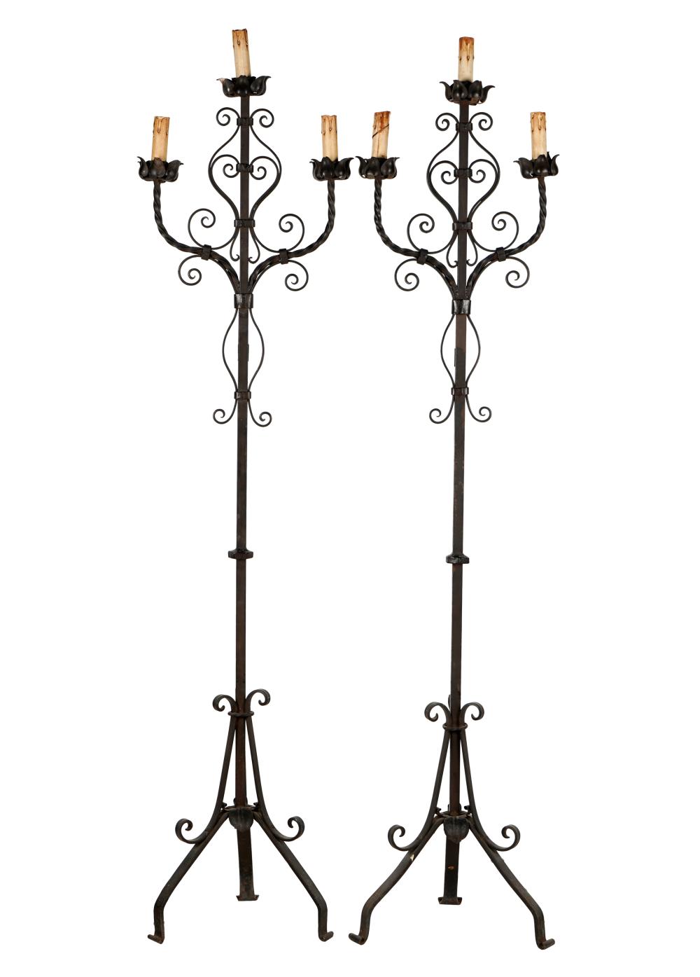 PAIR OF SPANISH REVIVAL IRON TORCHIERESeach