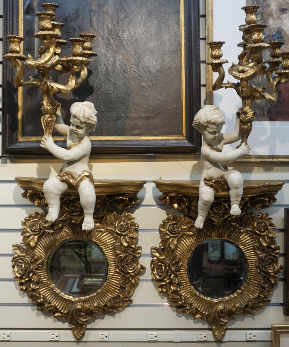 PAIR GILT COMPOSITION PUTTO MIRRORED 32e241