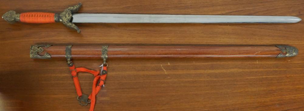 ASIAN SWORD WITH BRASS MOUNTED WOOD