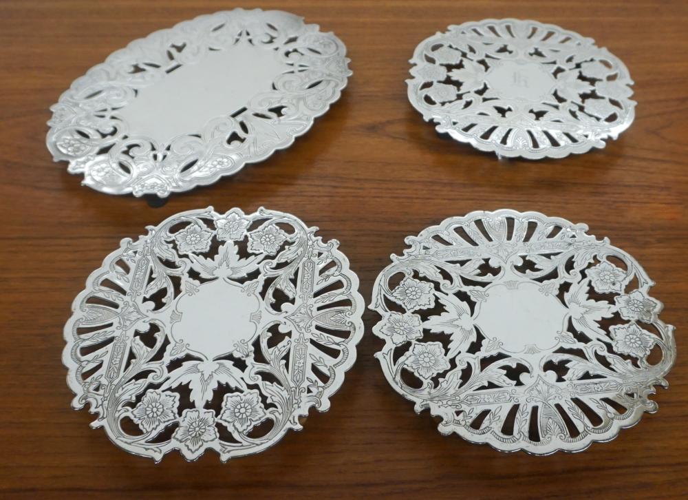 FOUR WALLACE SILVER PLATE TRIVETSFour