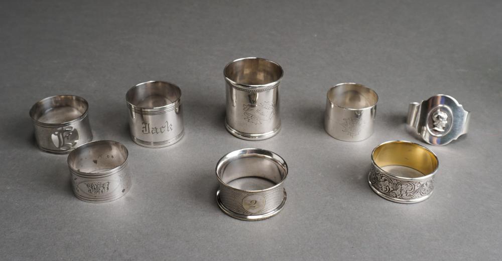 EIGHT ASSORTED SILVERPLATE NAPKIN RINGSEight