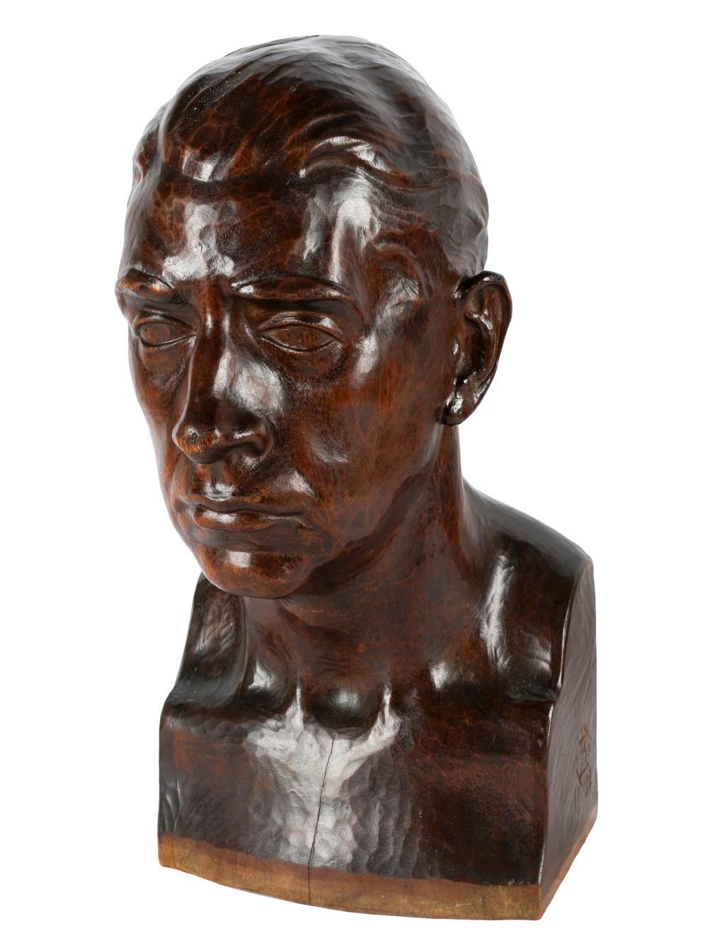 20TH CENTURY: HEAD OF A MANcarved wood;