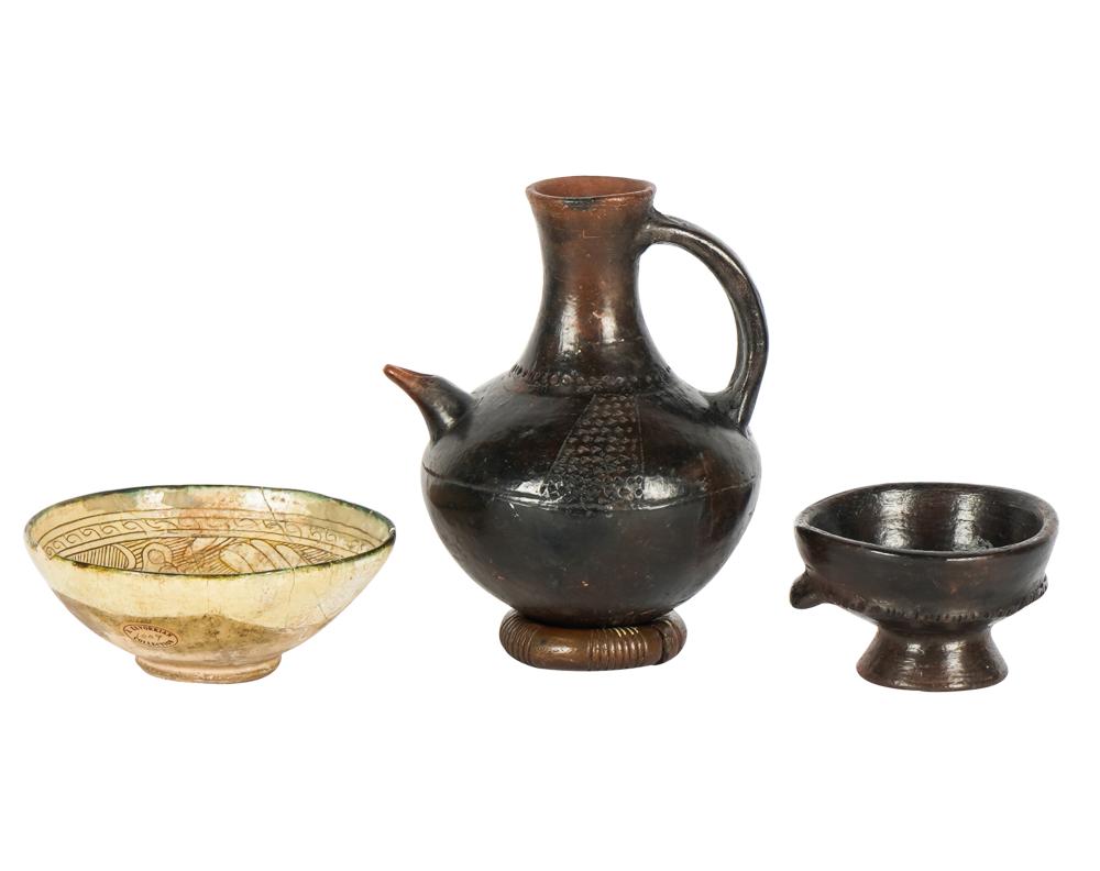 THREE PRIMITIVE POTTERY VESSELSthe