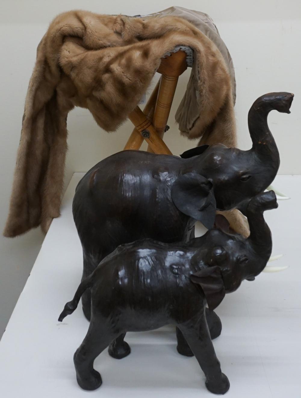 TWO LEATHER ELEPHANT FIGURES WITH