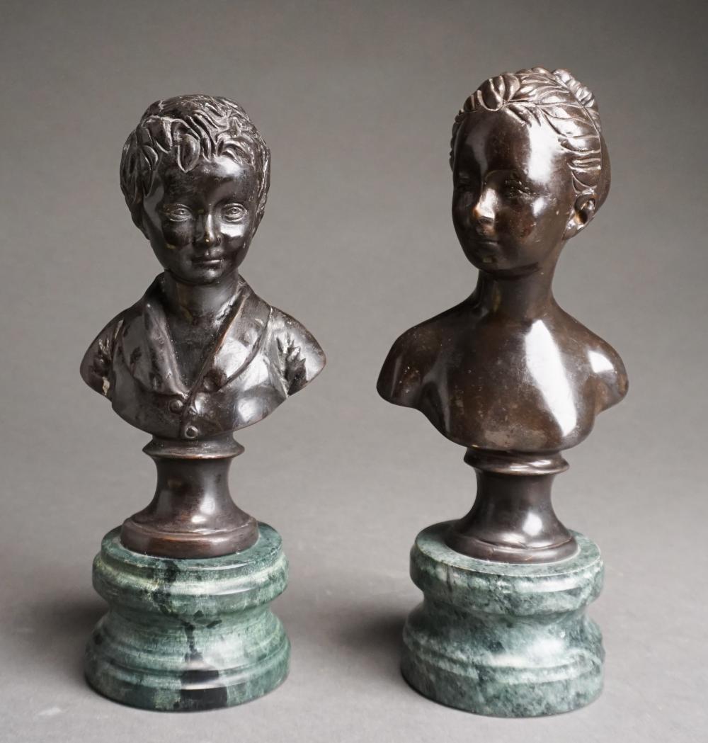 PAIR PATINATED METAL BUSTS OF BOY