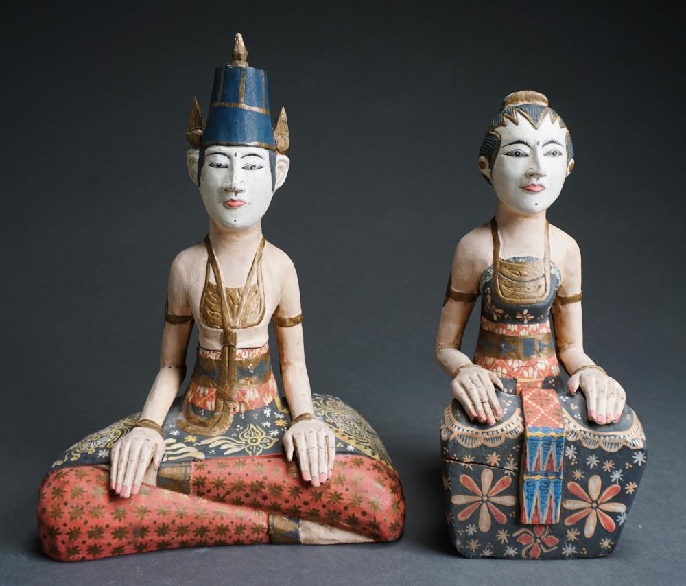 TWO SOUTHEAST ASIAN PAINTED WOOD FIGURES