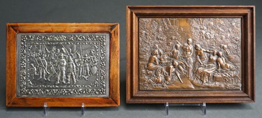 TWO METAL PLAQUES IN RELIEF, FRAME OF