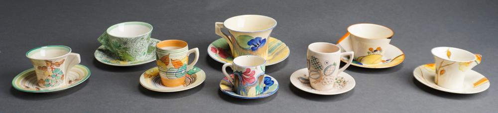 EIGHT CLARICE CLIFF CUPS AND SAUCERSEight