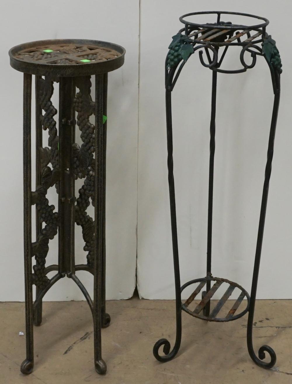 TWO PATINATED METAL PLANTER STANDSTwo