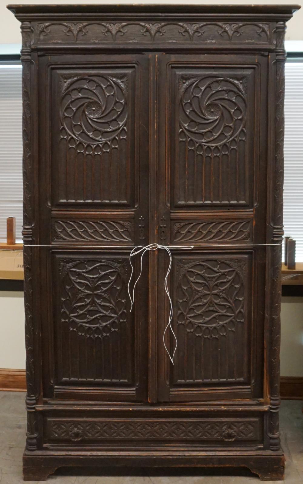 ELIZABETHAN STYLE CARVED OAK ARMOIRE