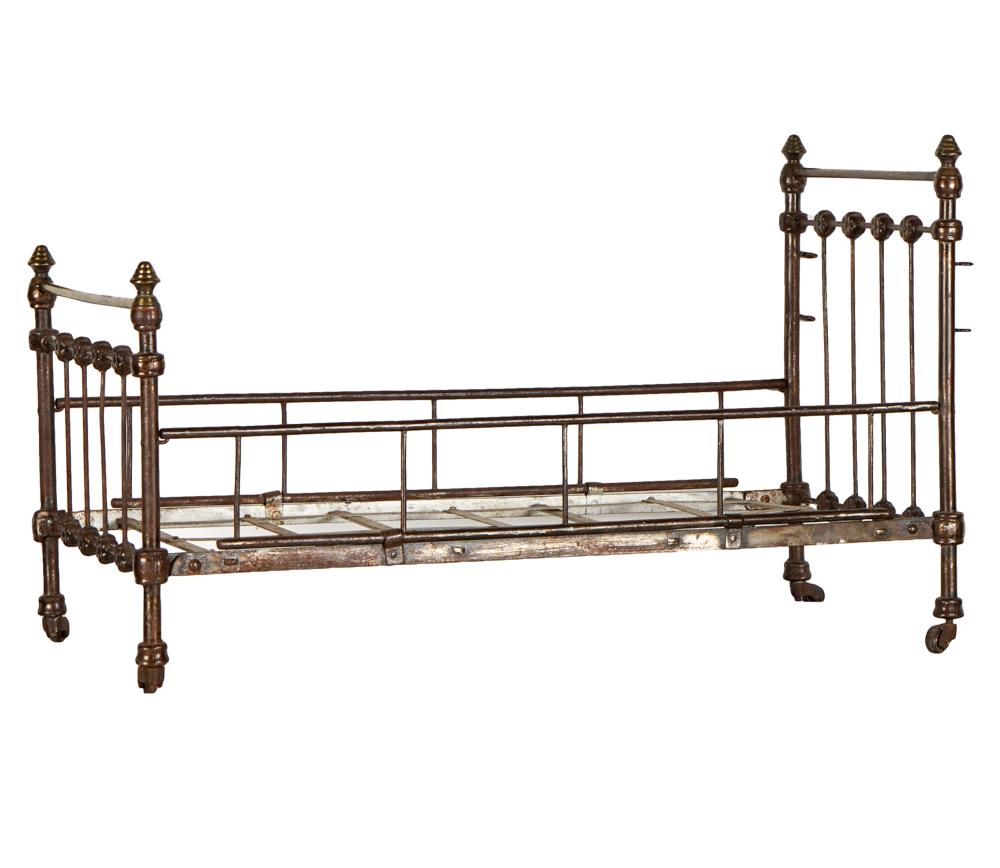 ANTIQUE BRASS DOLL BEDProvenance: Property