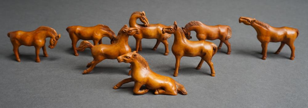 SET OF EIGHT CHINESE CARVED HORSE