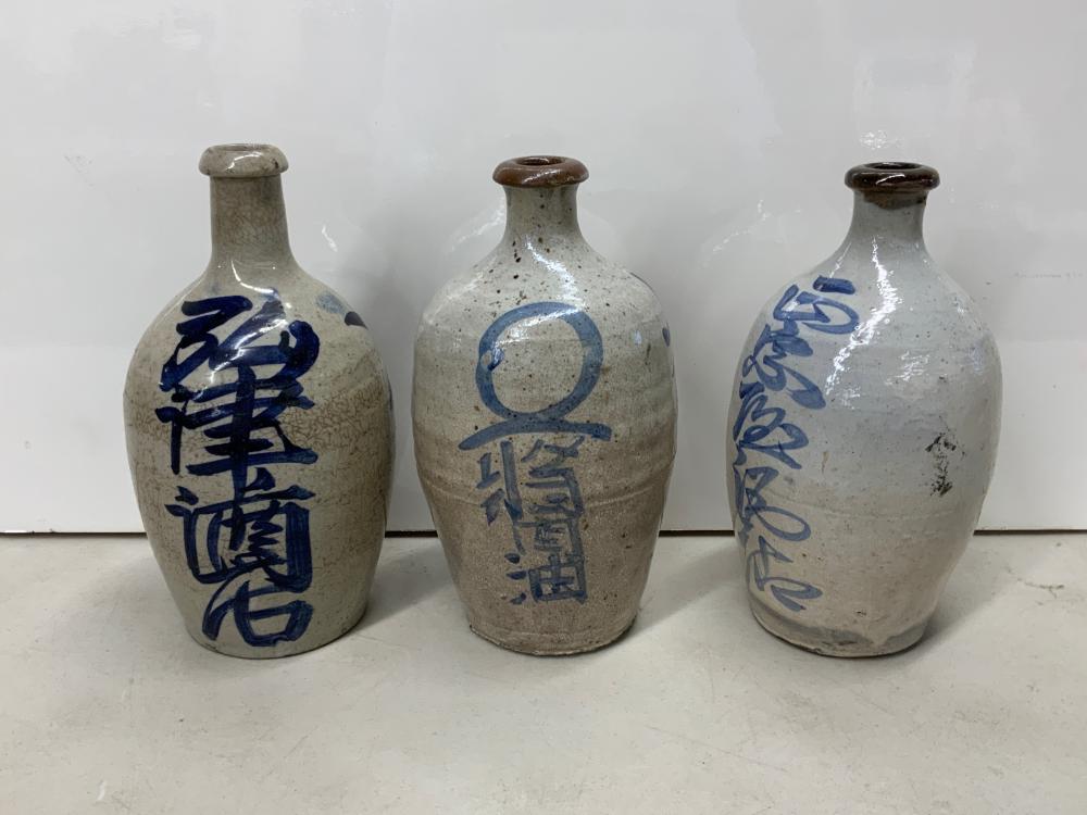 THREE JAPANESE BLUE AND WHITE GLAZED