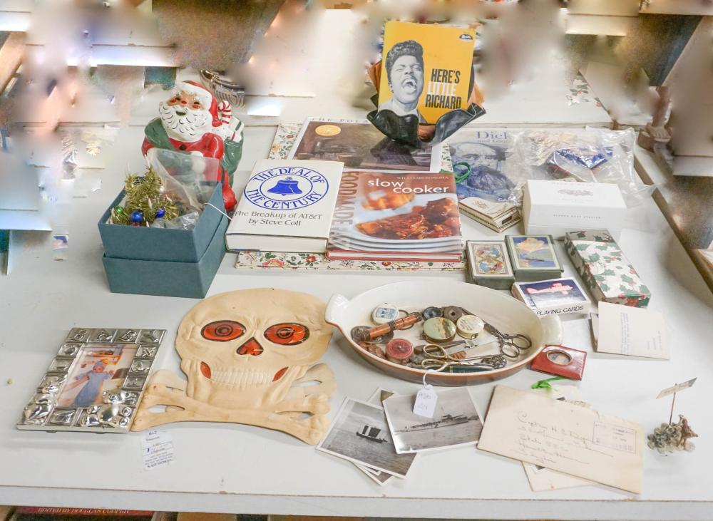 SMALL GROUP WITH BOOKS, PHOTOGRAPHS