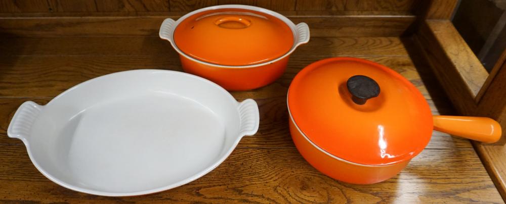 TWO ORANGE LE CREUSET ENAMEL CASSEROLES 32d27b