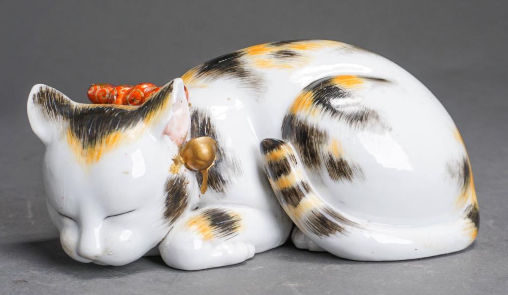 JAPANESE PORCELAIN FIGURE OF RECUMBENT 32d33b