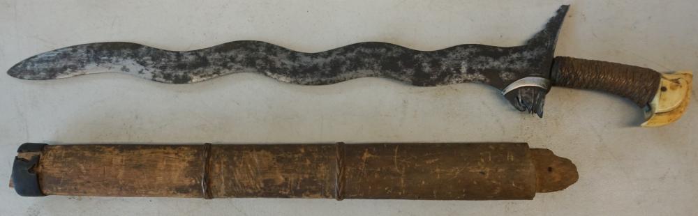 INDONESIAN KRIS WITH WOOD SHEATH,