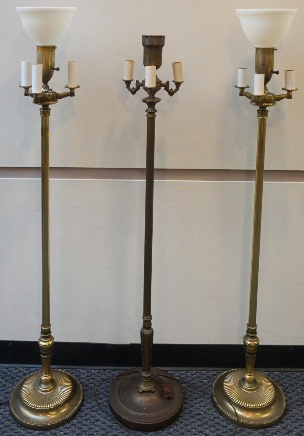 THREE MODERN BRASS TONE FLOOR LAMPS  32d46c