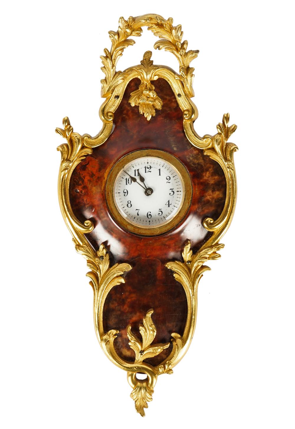 GILT METAL MOUNTED CARTOUCHE CLOCKwood 32d5f3