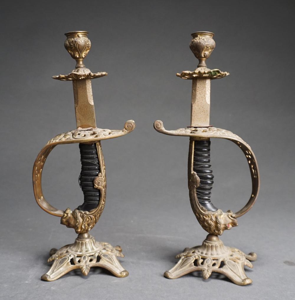 PAIR BRASS SWORD HANDLE CANDLESTICKS  32daa1