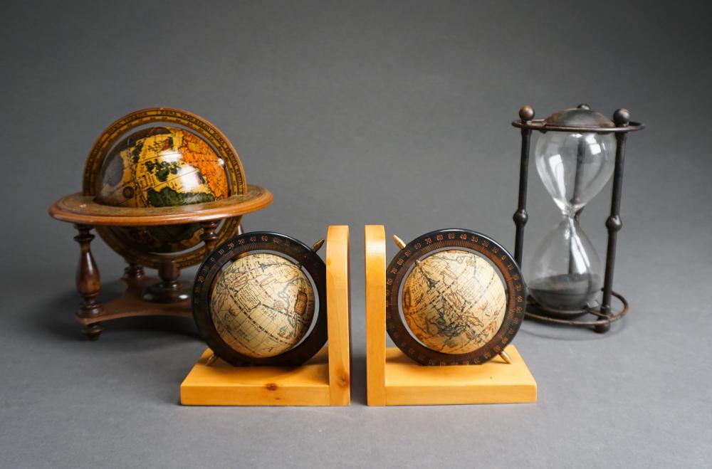 THREE MINIATURE GLOBES AND AN HOURGLASSThree 32de84