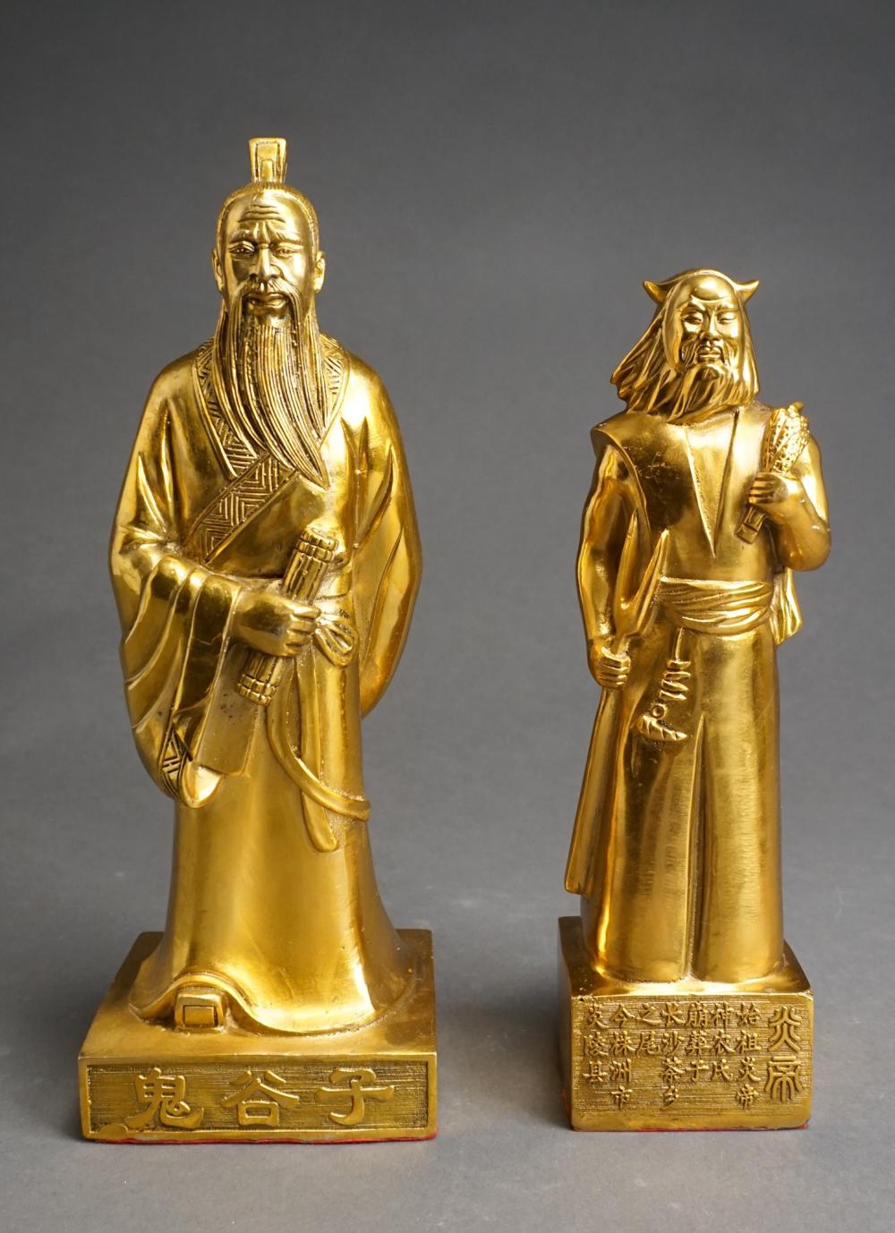 TWO CHINESE POLISHED BRASS FIGURES