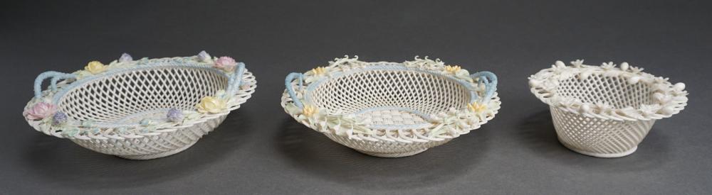 THREE BELLEEK FLORAL ENCRUSTED RIM BASKETS,