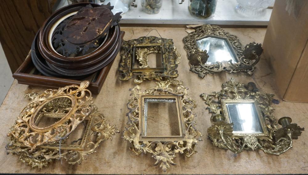 GROUP OF WOOD AND BRASS FRAMES