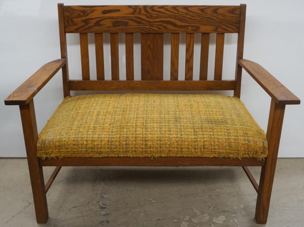 MISSION STYLE OAK UPHOLSTERED SETTEE,