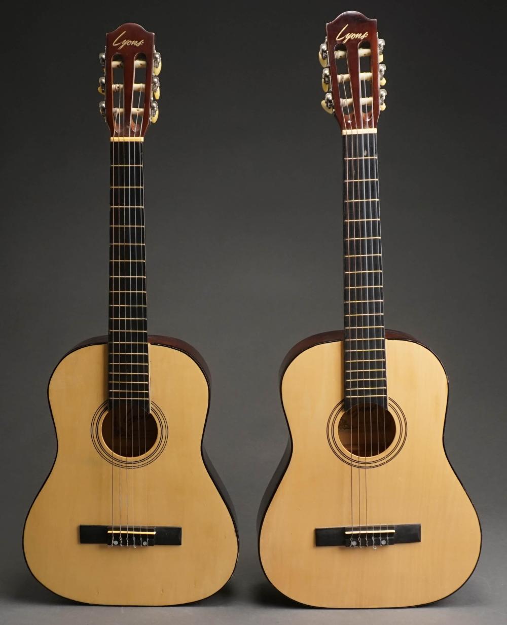 TWO LYONS ACOUSTIC GUITARS WITH CARRYING